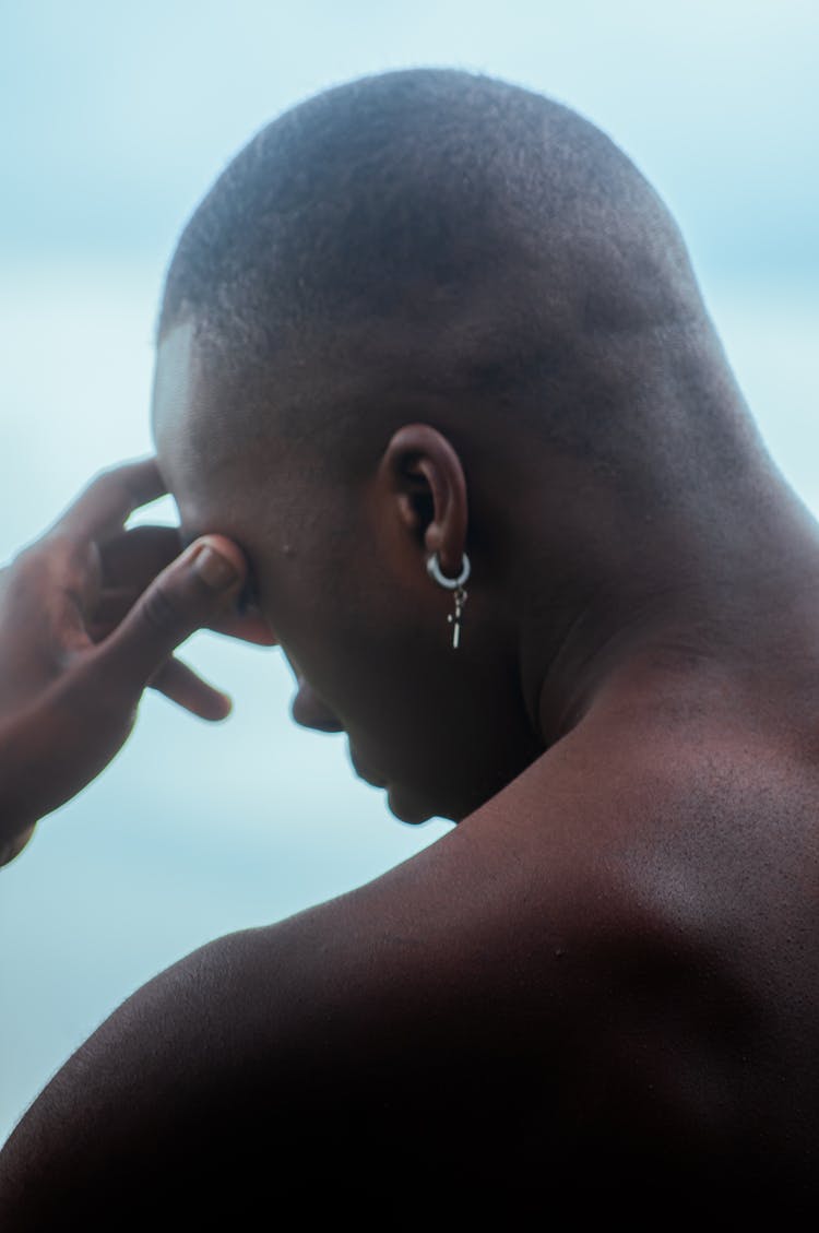 Shirtless Man Wearing Earring