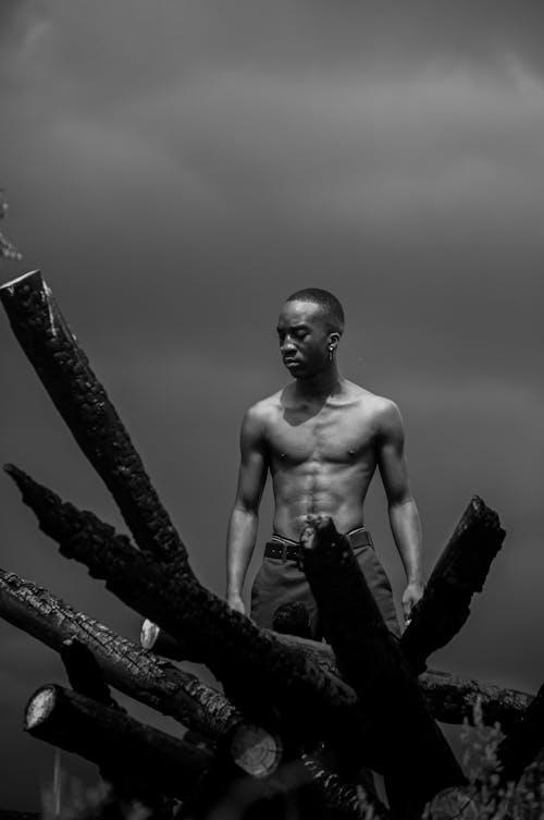 Free Grayscale Photo of a Topless Man Standing Stock Photo