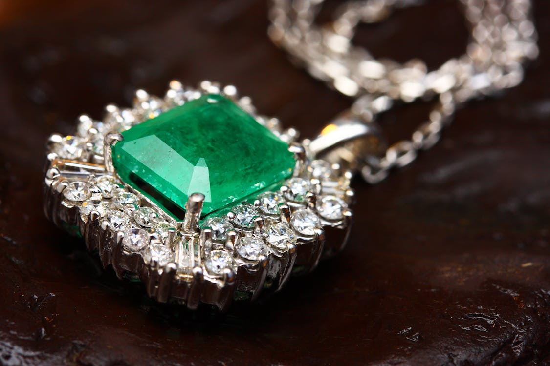 Free Silver-colored Pendant With Green Gemstone Stock Photo