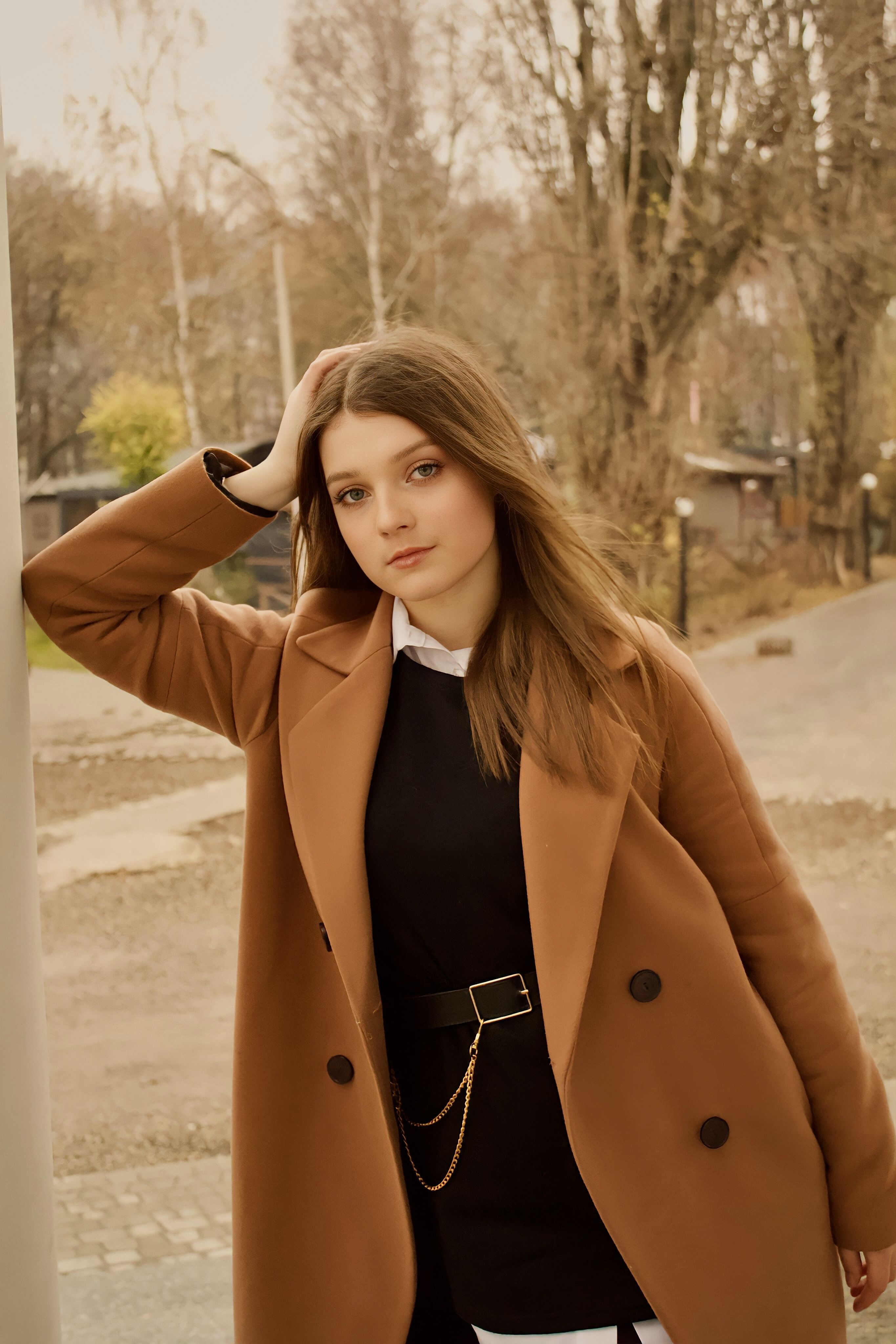 A Woman in Brown Coat · Free Stock Photo