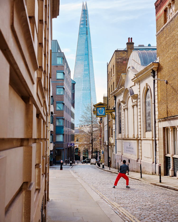 Man Standing On A City Street 