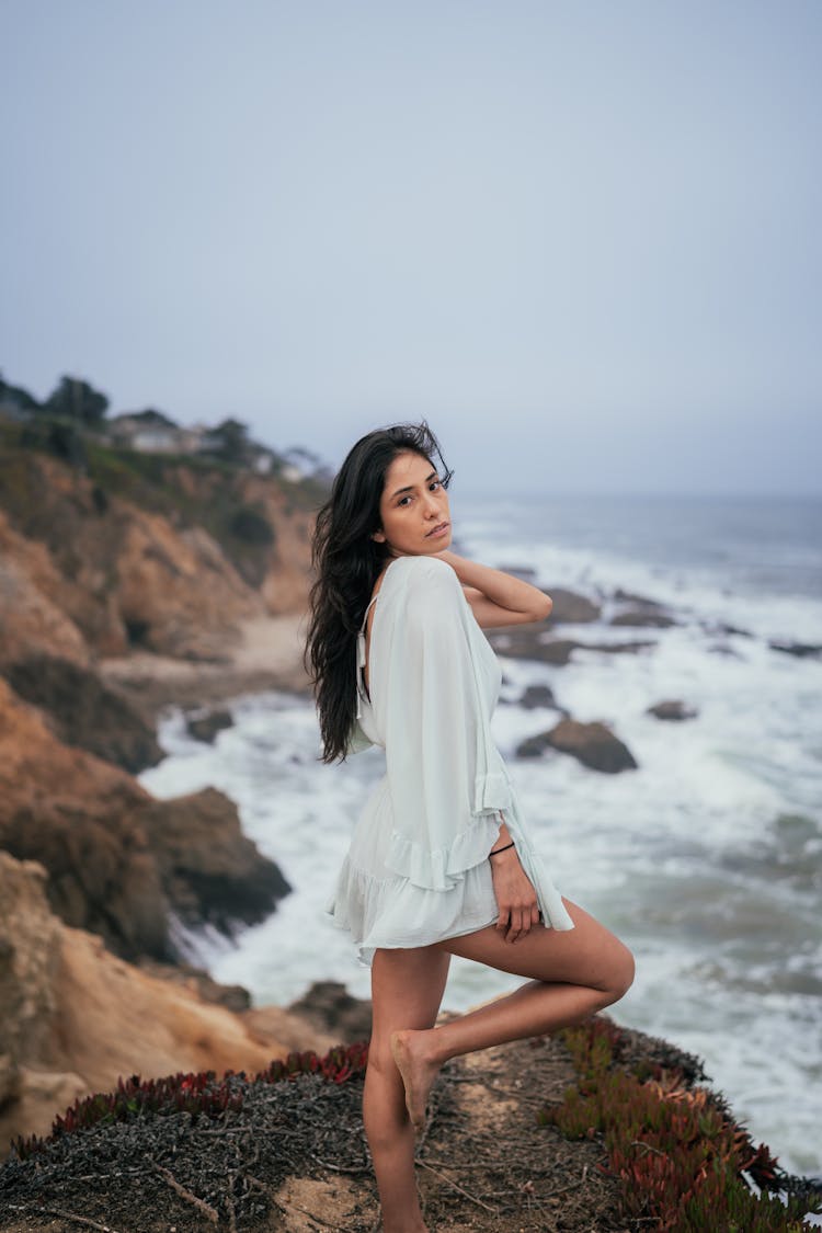 Seductive Woman On Sea Coastline