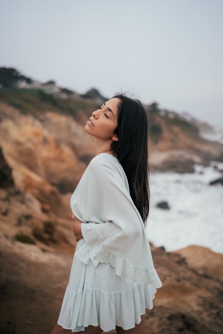 Seductive Woman On Sea Coastline