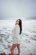 Figure on a misty beach — photo by Marcus Queiroga Silva on Pexels
