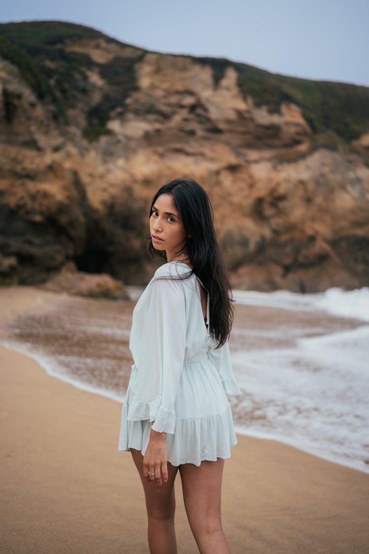 Seductive Woman On Sea Coastline