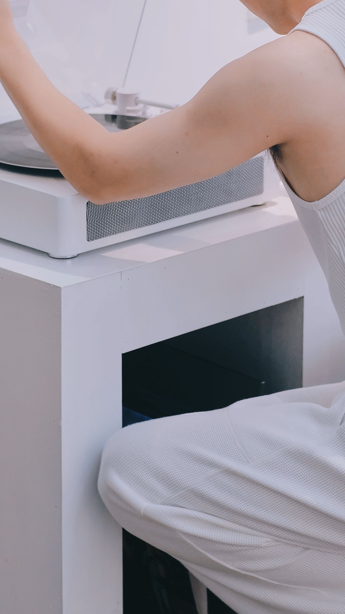 A minimalist white turntable