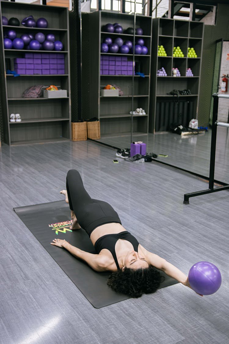 Woman Exercising With Ball