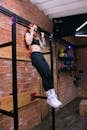 A Woman Doing Pull Ups