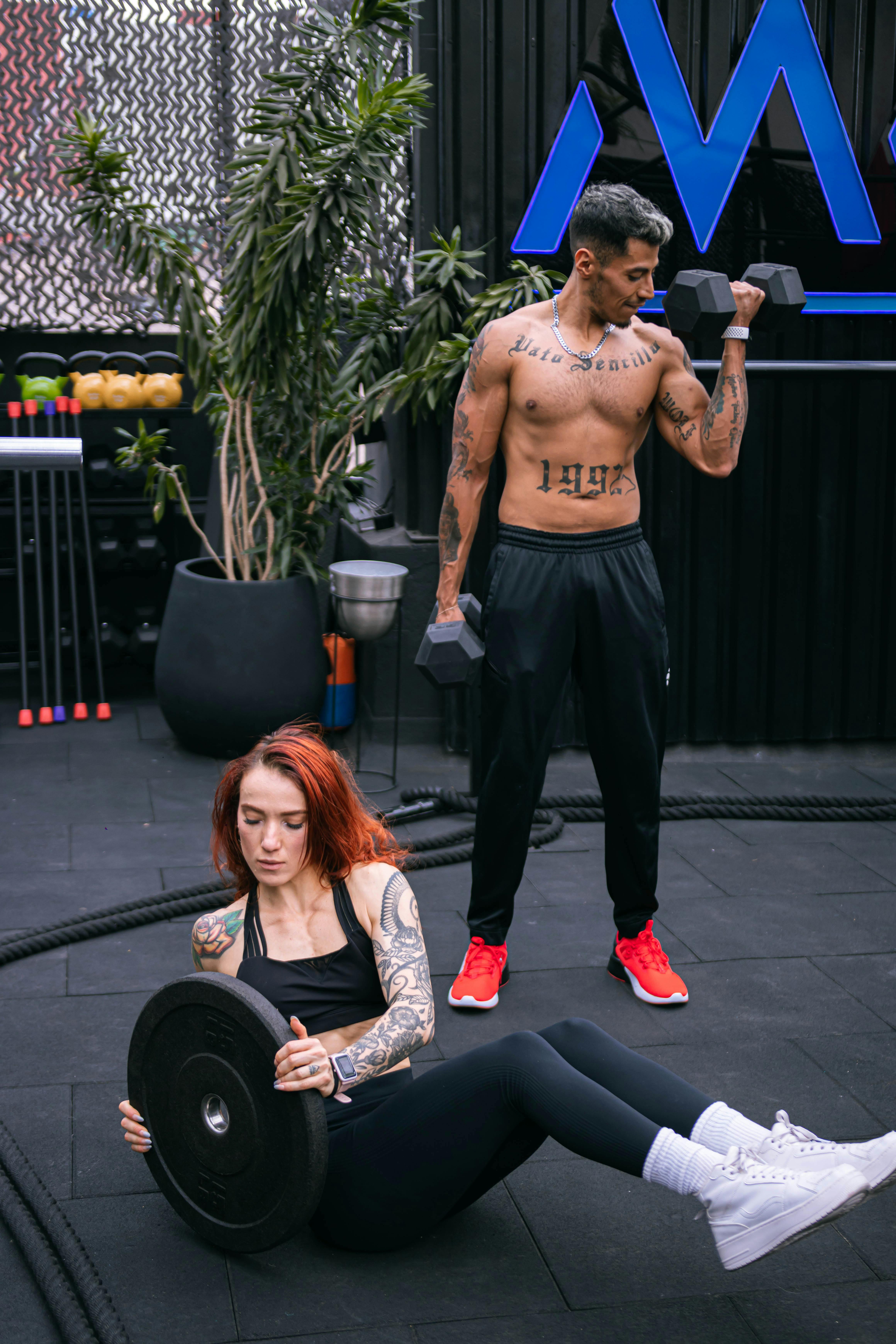 A Man Lifting Dumbbell while Wearing Virtual Goggles · Free Stock