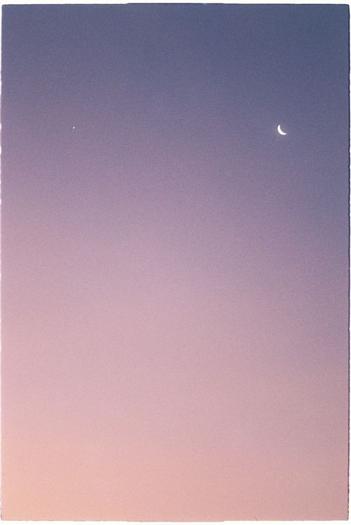 Free Serene crescent moon and star in a colorful twilight sky, capturing a peaceful evening atmosphere. Stock Photo