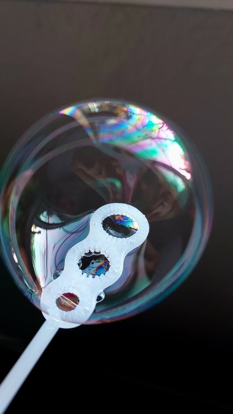 A Close-up Shot Of A Bubble On White Stick 