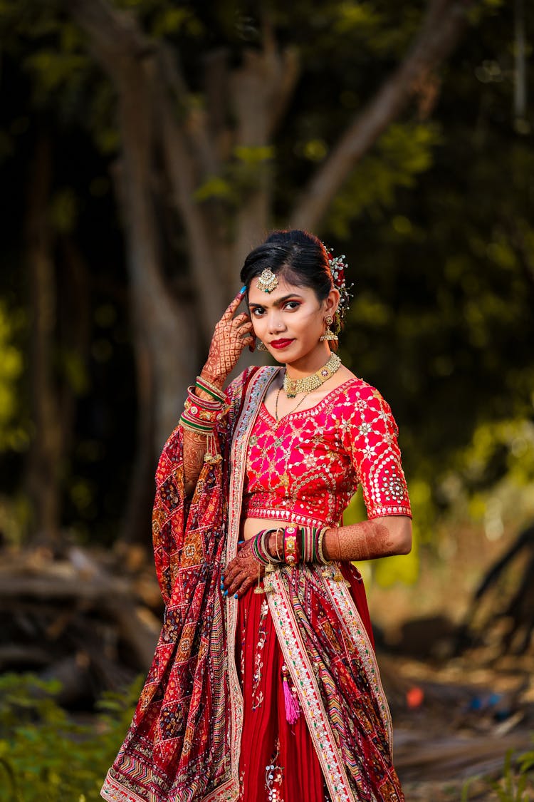 Beautiful Young Woman In Traditional Clothing 