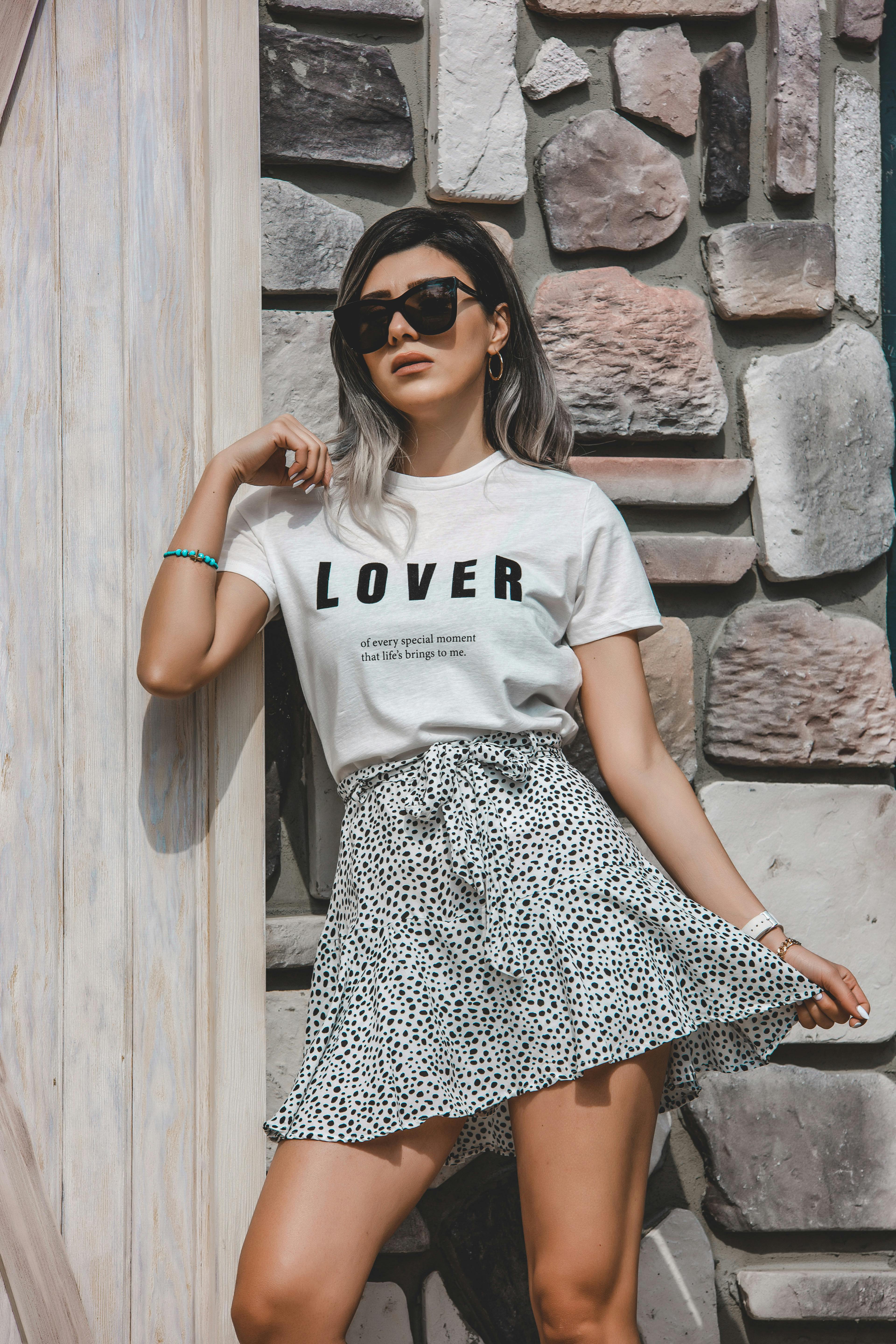 Photo of Woman Wearing Polka Dots Blouse and Skirt · Free Stock Photo