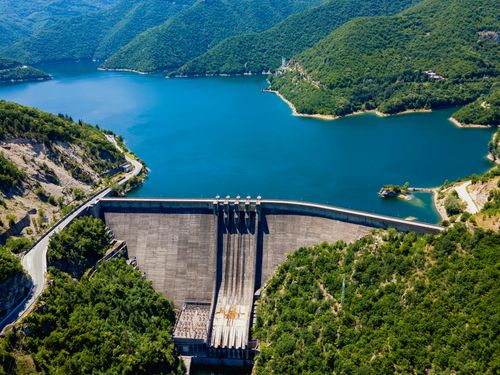 Free Stunning aerial view of Vacha Reservoir and dam in picturesque green landscape of Bulgaria. Stock Photo