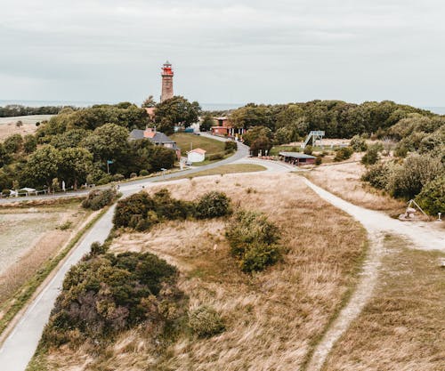 White House Near Pave Road and Far Away from Lighthouse