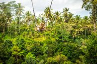 Woman Riding Giant Swing