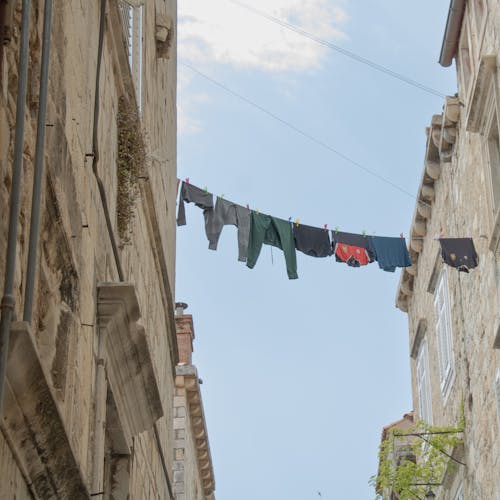 Clothes Hanging on Rope between Buildings