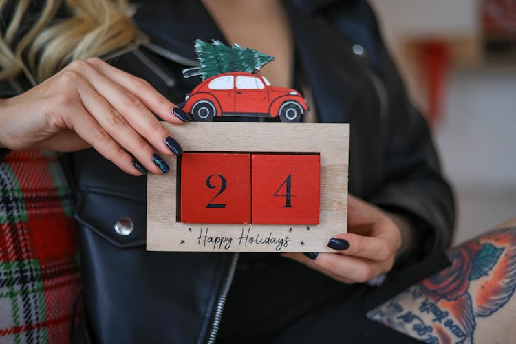 Hands Holding A Christmas Card