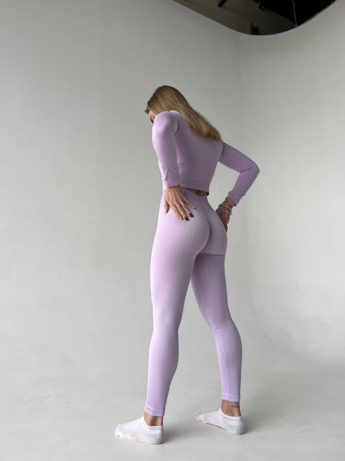 Woman in Sportswear Posing in Studio