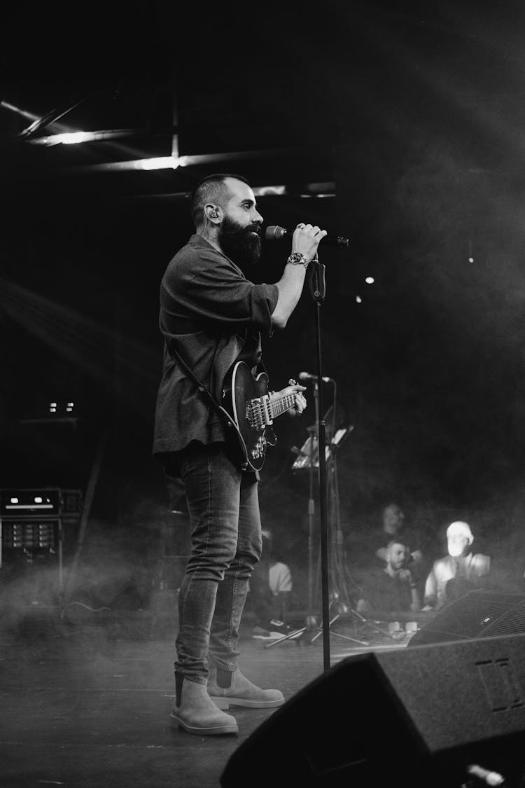 A Man Singing On The Stage