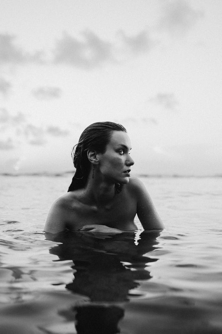 A Woman Swimming In The Ocean