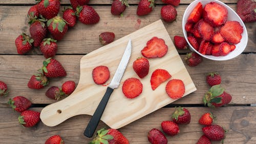 Flatlay Photography of Fresh Strawberries on Wooden Surface