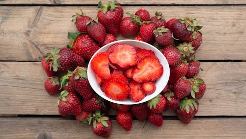 Slices of Strawberries in a Bowl