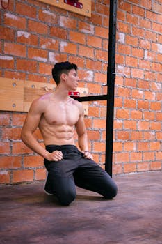 Strong young man in gym workout session in Ciudad de México, showcasing fitness and healthy lifestyle.