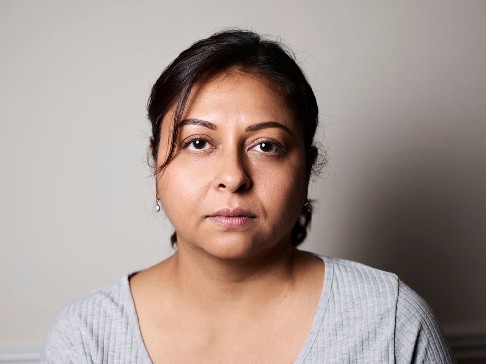 Portrait of Woman with Neutral Expression · Free Stock Photo