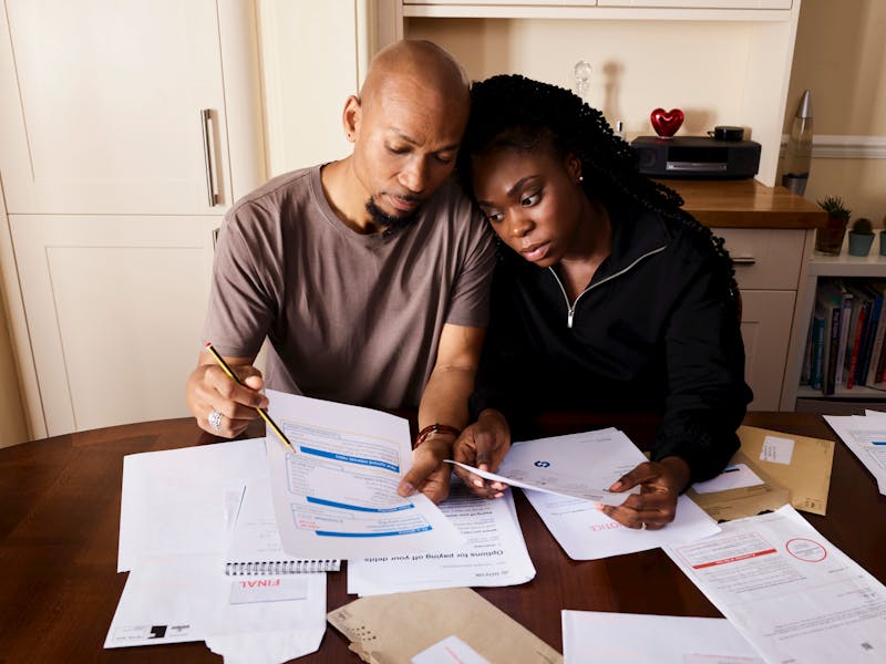 Couple reviewing eligibility documents