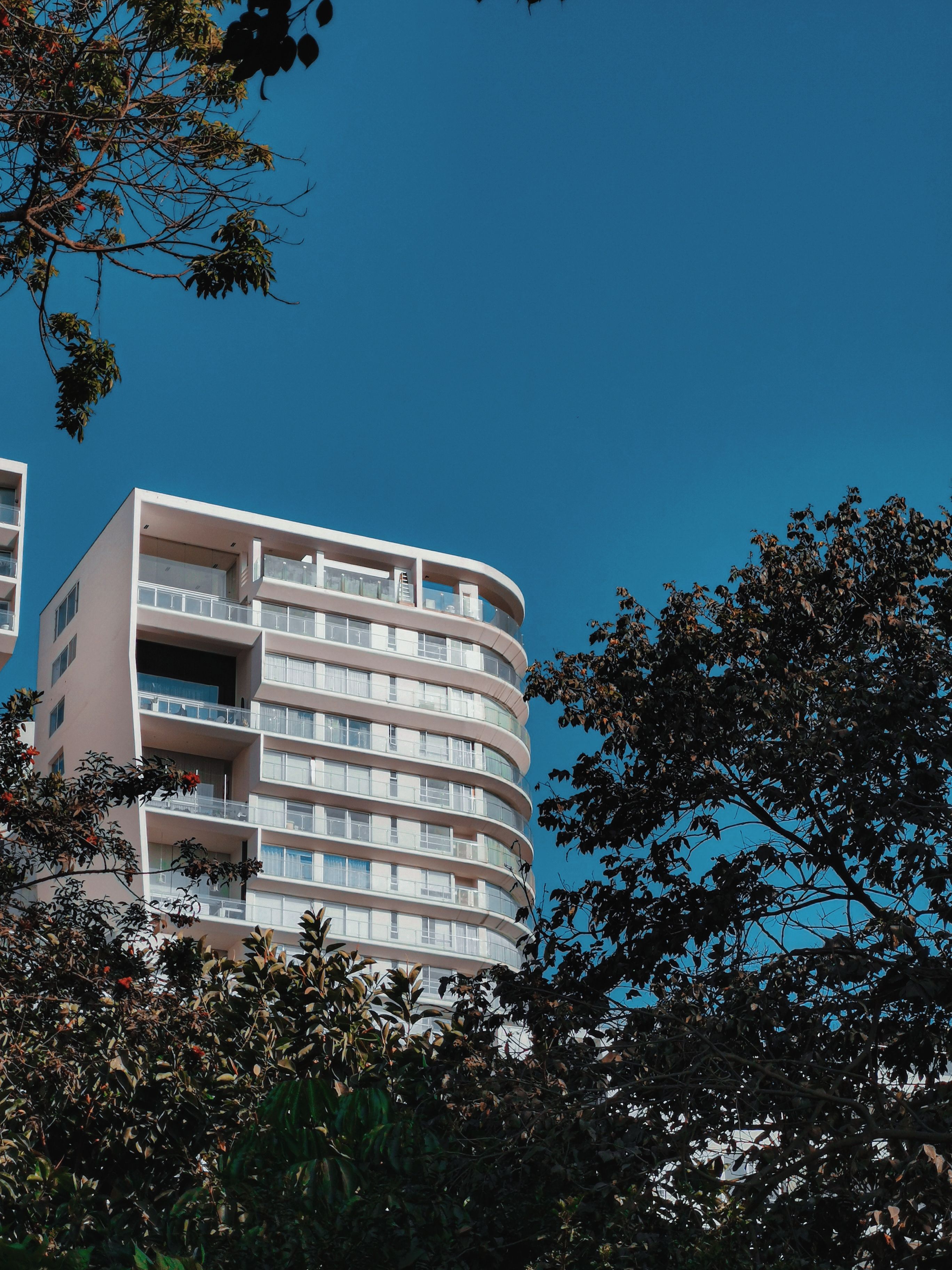 Residential Building under Blue Sky · Free Stock Photo