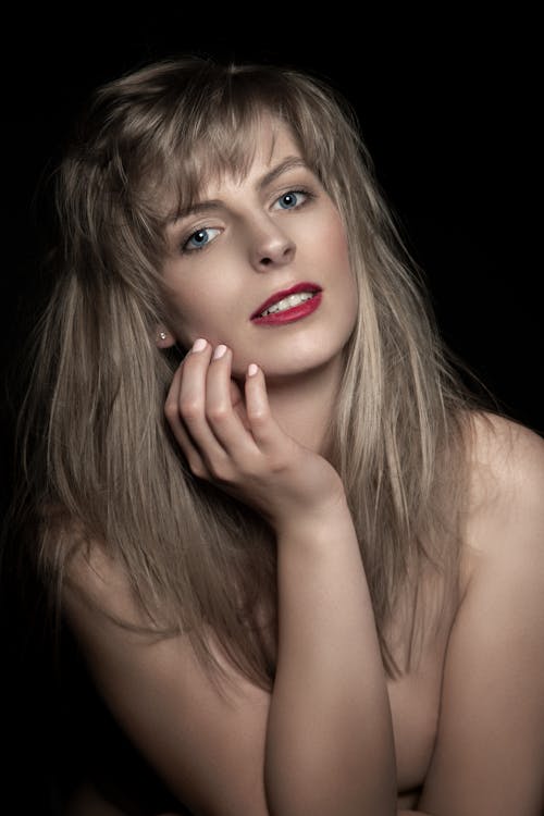 Portrait of Topless Woman Wearing Red Lipstick
