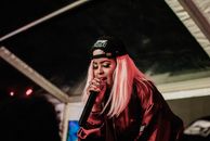Woman Singing on Stage