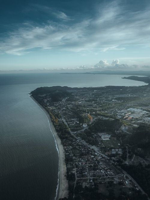 Free Stunning aerial shot of Chukai, Terengganu, Malaysia capturing its coastal expanse. Stock Photo