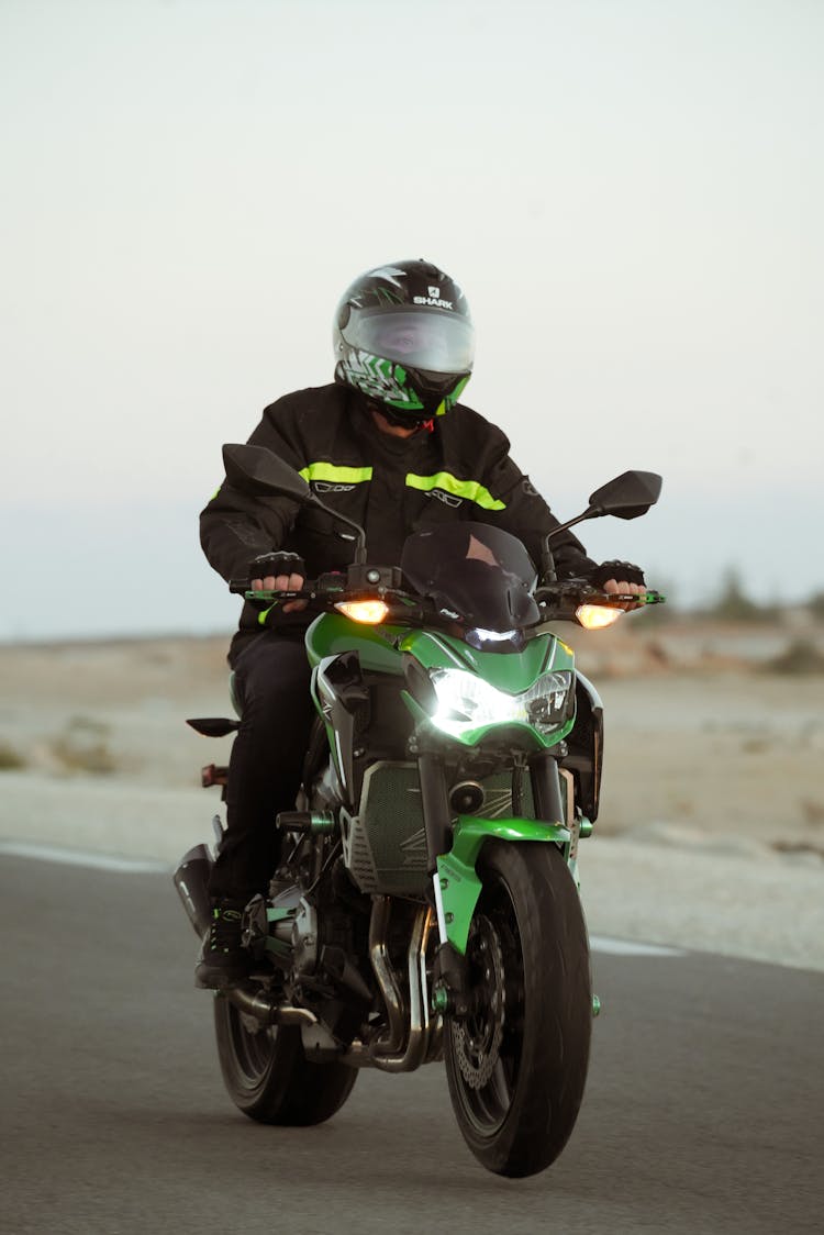 Man Riding A Motorcycle 