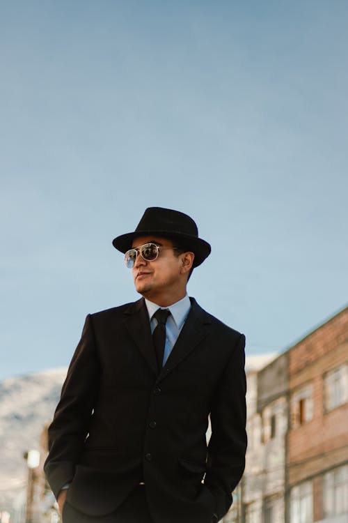 Elegant Man in a Suit and Hat 