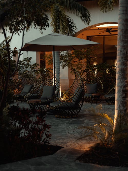 Lounge Chairs and Umbrellas in an Outdoor Restaurant 