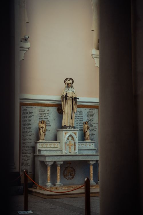 Free A serene view of a statue inside a historic church in Annaba, Algeria. Stock Photo