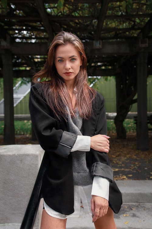 Young Fashionable Woman Posing in a Park