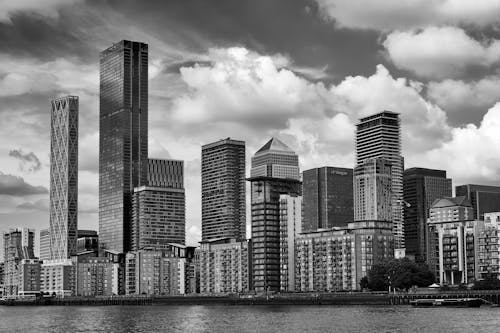 Grayscale Photo of High Rise Buildings in the City