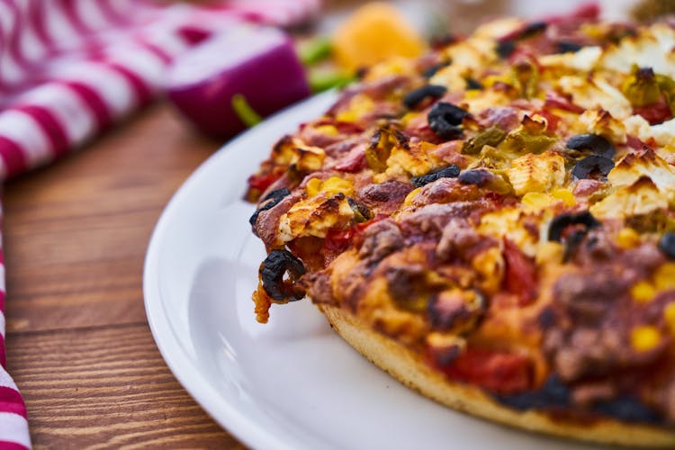 Pizza On White Ceramic Plate