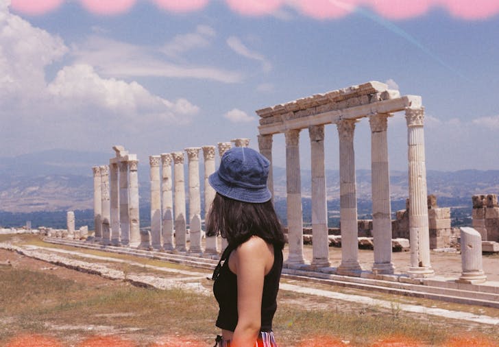 Person Sightseeing on Fascinating Ancient Greek Ruins