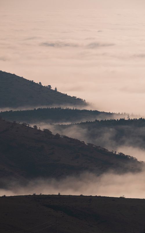 Free Captivating view of fog-covered mountain layers in Amasya, Türkiye. Stock Photo