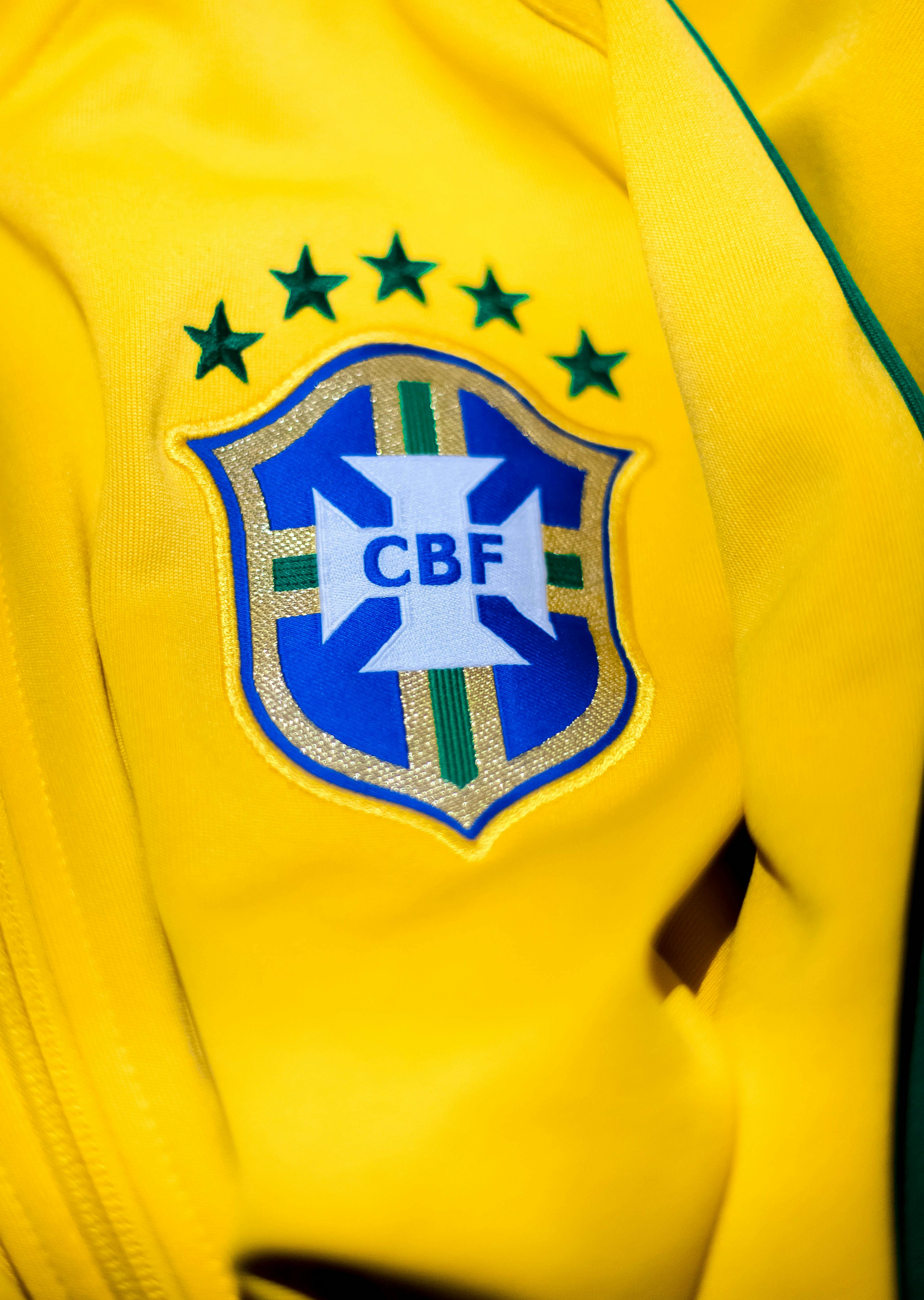 A close up of the logo on a soccer jersey photo – Free Brazil Image on  Unsplash