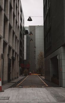 Explore the sleek and contemporary architecture of a Dublin alley with dramatic lighting and urban vibes.