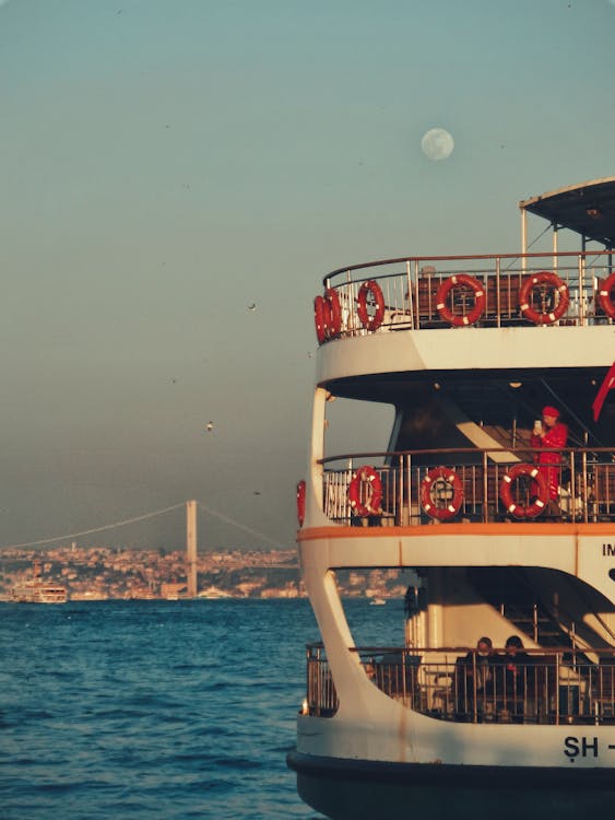 Passengers on a Ferry at Sunset 