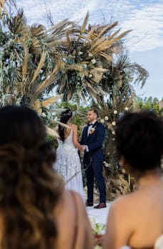 Beautiful outdoor wedding in San Miguel de Allende with bride and groom exchanging vows.