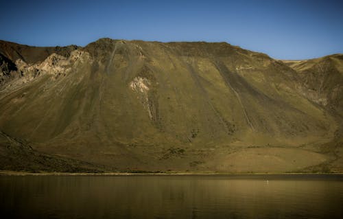 Steep Mountain Over a Lagoon