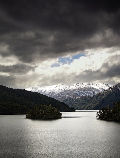 Dark clouds over a big lake in a Mountain Landscape