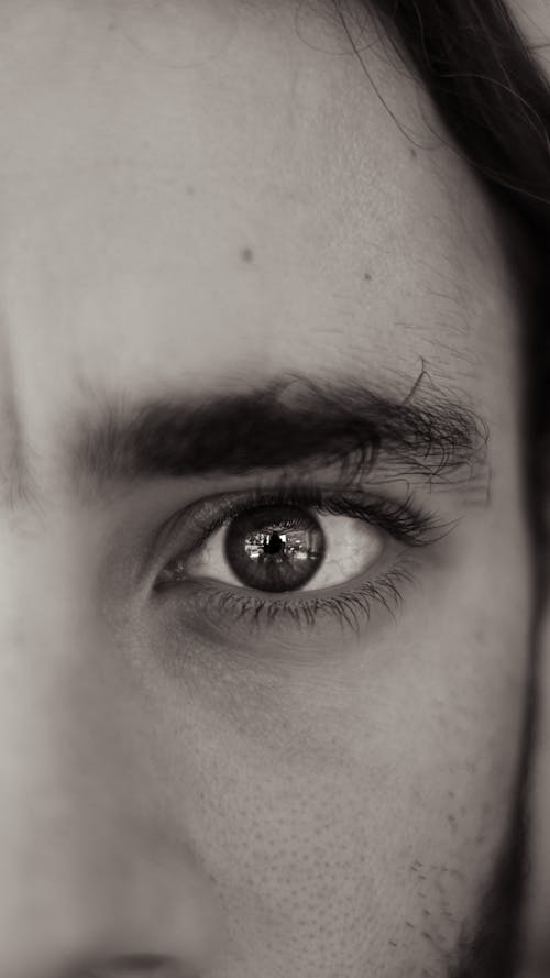 Frame of a young man's stare sight in black and white